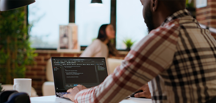 man working at laptop